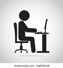 Man sitting front of computer on work table icon