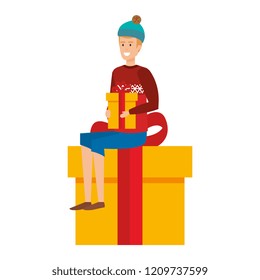 man sitting in gift with christmas clothes