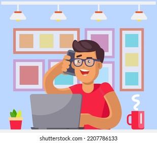 Man sitting with laptop and smartphone at workplace. Manager typing on computer and talking on phone. Employee doing many tasks in office. Multitasking freelancer during work with technology