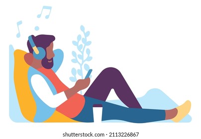 Man sitting with music in headphones. Leisure time concept