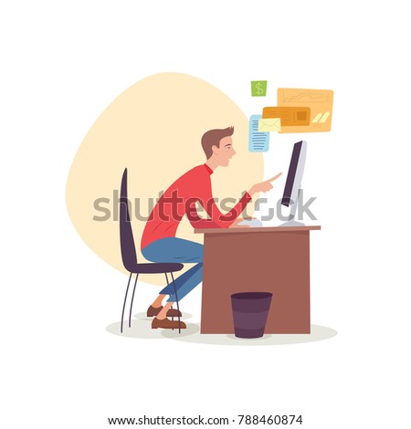 Man sitting in office working with computer looking at monitor.