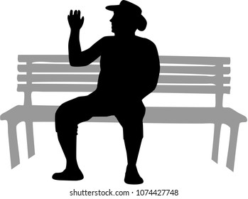 A man sitting on a bench.