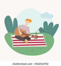 A man is sitting on a blanket in the park and playing the guitar. flat design style minimal vector illustration.