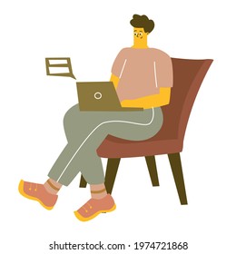 A man is sitting on a chair with a laptop. Jobs, training, online communication. The man conducts correspondence online, sits in a chat