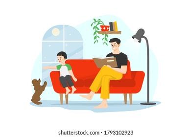 A man sitting on a couch reading book while his son playing with his dog at home during quarantine time