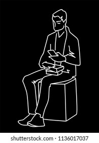 Man sitting on cube with some books looking at smartphone. White lines on black background. Vector illustration of man searching information in simple line art style. Monochromatic hand drawn sketch. 