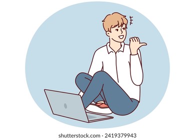 Man sitting on floor with laptop and looking back pointing finger doing college assignment. Casual guy freelancer enjoys remote work for internet companies or start-ups. Flat vector design