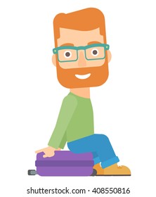 Man sitting on his suitcase.