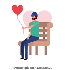 man sitting on park chair with hearts character