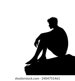 Man sitting on rock silhouette