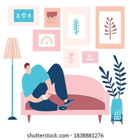 A man sitting on the sofa and holding a cup in his hands. Vector flat cartoon illustration in white background