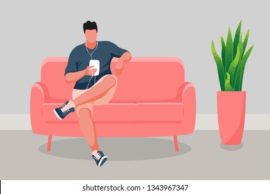 Man sitting on the sofa. Man listening music from a smartphone. Vector illustration