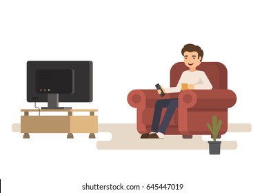 Man sitting on sofa watching tv and drink cup of coffee.