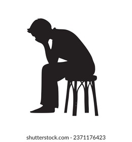 A man sitting on a stool in a dejected state