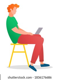 Man sitting on the tabouret and working with laptop in social networks isolated on white. Redheaded male character on the chair in casual clothes holding computer on his knees typing keyboard