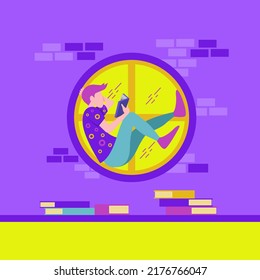man sitting on a yellow window reading a purple book