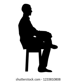 Man sitting pose Young man sits on a chair with his leg thrown silhouette icon black color