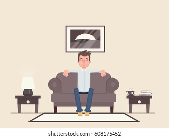 The Man Is Sitting In The Room And Resting. Vector Illustration In A Flat Style.