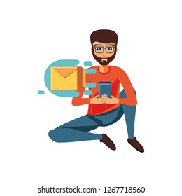 man sitting with smartphone and envelope mail