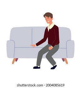 man sitting in a sofa isolated