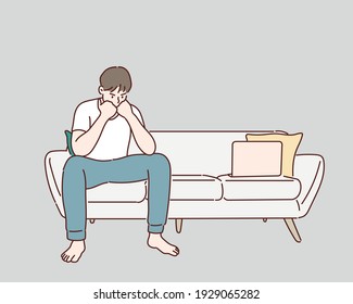 man sitting at sofa in living room, feeling stressed or headache, alone. Hand drawn style vector design illustrations.