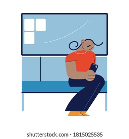 Man sitting in subway coach and looking on smartphone screen