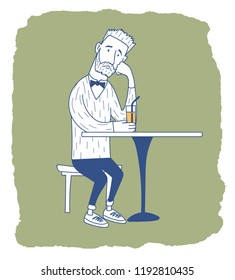 A man is sitting at a table.