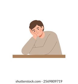 man is sitting at a table with his head in his hands