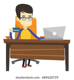 Man sitting at the table with laptop and holding credit card in hand. Man using laptop for online shopping. Man shopping online at home. Vector flat design illustration isolated on white background.