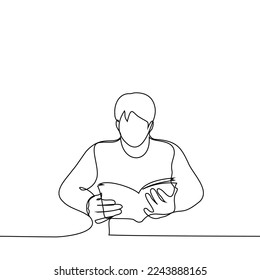 man is sitting at a table with a paperback book - one line drawing vector. book lover concept, reader in library, student with textbook