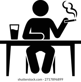 Hombre sentado en la mesa fumando cigarrillos y bebiendo