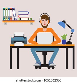 Man sitting at table and working on laptop. Workspace.