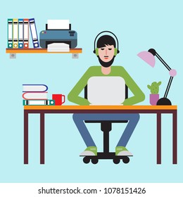 Man sitting at table and working on laptop. Workspace.