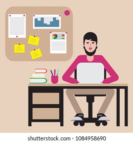 Man sitting at table and working on laptop. Workspace.