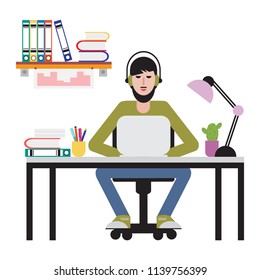 Man sitting at table and working on laptop. Workspace.