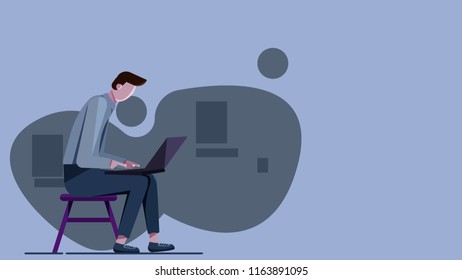 A man is sitting and working behind a laptop