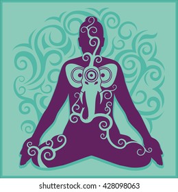 a man sitting in a yoga pose and meditating on a turquoise background