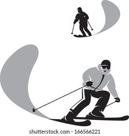 man skiing down a slope