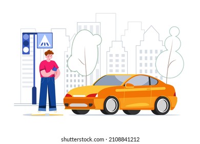 A man with a smartphone standing near the car