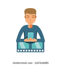 man with smartphone and video tape