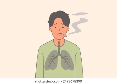 Man smoker with lung cancer suffers from nicotine addiction, stands with cigarette in mouth. Problem smoking destroyed health of smoker, unable to give up cigarettes and lead healthy lifestyle.