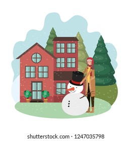 man with snowman and house in winter 