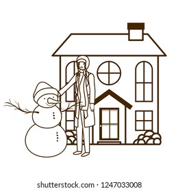 man with snowman outside of the house
