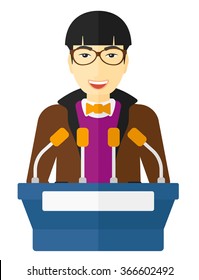 Man speaking on podium.