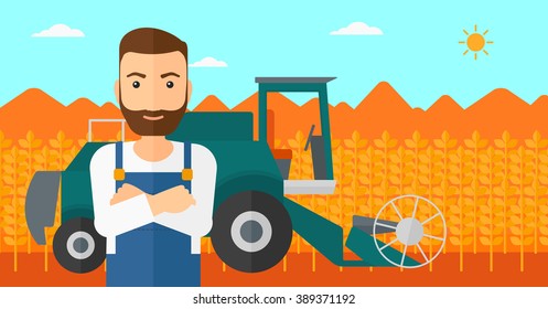 Man standing with combine on background.