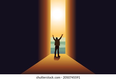 A man standing in Dark with hands raised  at the end of the Tunnel concept for religion, worship, prayer ,New Possibilities, Hope,Overcome Business Problems, Solution Finding.