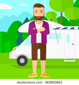 Man standing in front of motor home.