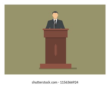 a man standing and giving speech on a podium 