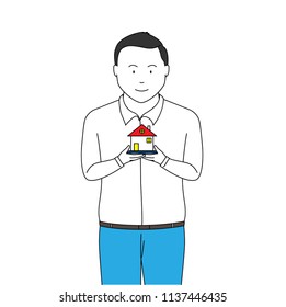 man standing holding home model in business concept