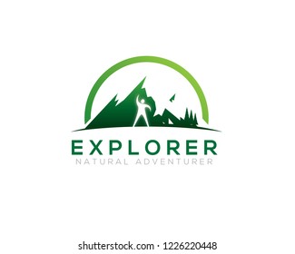 man standing lifting hand in front of mountain 2